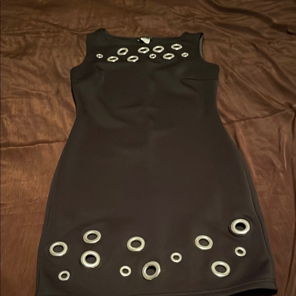 Elegant Black Sleeveless Dress with silver grommets